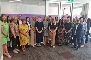 A group of people including Minister for Health Amber-Jade Sanderson stand together at the opening of the Kara Maar Specialist Eating Disorder Clinic