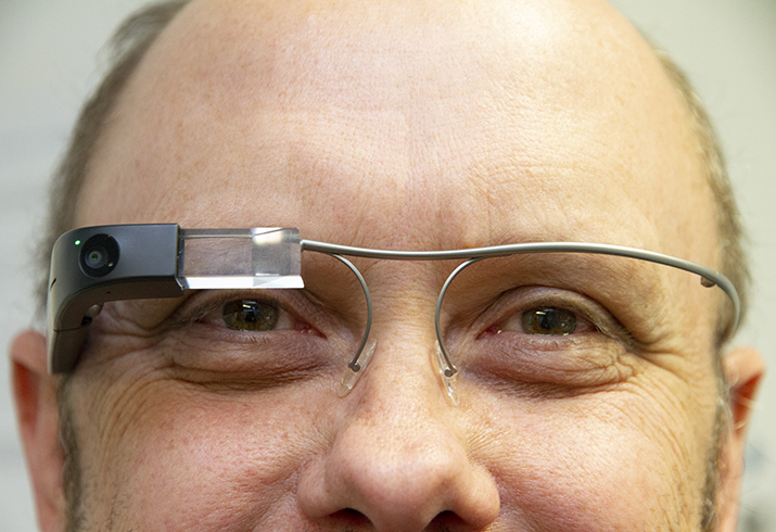 Zoom up on man's face wearing Google glasses